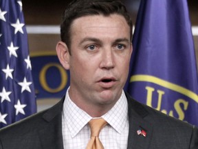 FILE - In this April 7, 2011, file photo, Rep. Duncan Hunter, R-Calif., speaks during a news conference on Capitol Hill in Washington. Hunter and his wife Margaret faced arraignment Thursday, Aug. 23, 2018, in San Diego on charges they illegally used his campaign account for personal expenses.