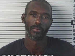 CORRECTS LAST NAME TO MORTON, NOT MORTEN - This Friday, Aug. 3, 2018, photo released by Taos County Sheriff's Office shows Lucas Morton. Morton was arrested on suspicion of harboring a fugitive after law enforcement officers searching a rural northern New Mexico compound for a missing 3-year-old boy found 11 children in filthy conditions and hardly any food. (Taos County Sheriff's Office via AP)
