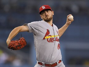 St. Louis Cardinals starting pitcher Austin Gomber throws to the plate during the first inning of a baseball game against the Los Angeles Dodgers Monday, Aug. 20, 2018, in Los Angeles.