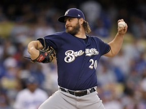 Milwaukee Brewers starting pitcher Wade Miley throws during the second inning of the team's baseball game against the Los Angeles Dodgers on Tuesday, July 31, 2018, in Los Angeles.