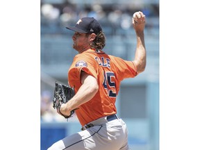 Houston Astros starting pitcher Gerrit Cole delivers a pitch during the first inning of a baseball game against the Los Angeles Dodgers in Los Angeles, Sunday, Aug. 5, 2018.