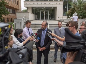 Jeff Lee, lawyer representing the Humboldt Broncos Memorial Fund, speaks to media following a court hearing related to money raised following the Humboldt Broncos bus crash outside the Court of Queens Bench in Saskatoon, Wednesday, August 15, 2018.
