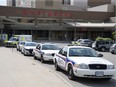 Police cars filled the parking zone at Victoria Hospital for two hours after seven inmates were rushed to hospital after overdosing on drugs at the Elgin Middlesex Detention Centre in London on Thursday.