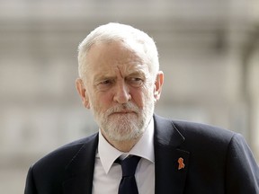 FILE - In this Monday, April 23, 2018 file photo, Britain's opposition Labour party leader Jeremy Corbyn arrives to attend a Memorial Service to commemorate the 25th anniversary of the murder of black teenager Stephen Lawrence at St Martin-in-the-Fields church in London. British opposition leader Jeremy Corbyn, facing allegations of enabling anti-Semitism, has acknowledged he was present at a wreath-laying to Palestinians allegedly linked to the murder of 11 Israeli athletes at the 1972 Munich Olympics. But the Labour Party leader said on Monday, Aug. 13 "I don't think I was actually involved" in laying the wreath.