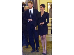 Britain's Prince Harry and Meghan, Duchess of Sussex Victoria Palace Theatre before attending a gala performance of the musical Hamilton, in support of the charity Sentebale, in London, Wednesday, Aug. 29 2018. The evening will raise awareness and funds for Sentebale's work with children and young people affected by HIV in southern Africa.