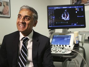 Dr. Sanjay Sharma, professor of cardiology at St. George's University of London, speaks during an interview on Wednesday Aug. 8, 2018 about a study he led which found procedures that can help identify athletes who are at risk for heart-problems. He said the British soccer program will start re-checking players' hearts at ages 18, 20 and 25.