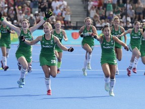 Ireland's Chloe Watkins, left, and teammate Anna O'Flanagan celebrate winning a shootout to win the semifinal match between Ireland and Spain, during the Women's Hockey World Cup at the Lee Valley Hockey and Tennis Centre in London, Saturday Aug. 4, 2018.
