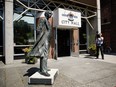 A statue of Canada's first prime minister, Sir John A. Macdonald, is seen on Aug. 8, 2018, before it was removed from in front of Victoria City Hall.