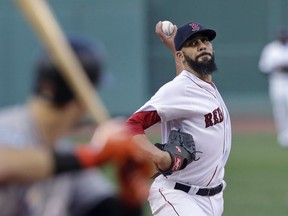 Boston Red Sox starting pitcher David Price delivers during the first inning of a baseball game against the Miami Marlins at Fenway Park in Boston, Wednesday, Aug. 29, 2018.