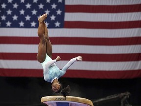 Simone Biles competes on the vault at the U.S. Gymnastics Championships, Sunday, Aug. 19, 2018, in Boston.