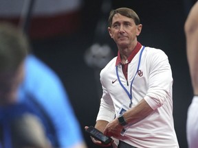 USA Gymnastics coach Mark Williams watches during a training session at the U.S. Gymnastics Championships, Wednesday, Aug. 15, 2018, in Boston. The president is new. The board of directors is new. The leadership at the Olympic level is new. And yet USA Gymnastics is still searching for its footing nearly two years after the initial fallout from the sexual abuse scandal surrounding former national team doctor Larry Nassar began, with everyone from the athletes to club owners wondering when one of the US Olympic movement's marquee programs is going to truly start moving forward.