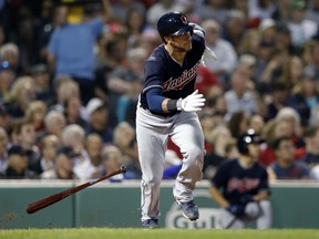 Cleveland Indians' Yan Gomes runs on his RBI-single during the fourth inning of a baseball game against the Boston Red Sox in Boston, Tuesday, Aug. 21, 2018.