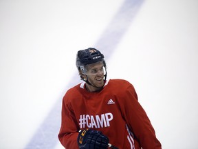 Edmonton Oilers captain Connor McDavid smiles during the BioSteel Pro Hockey Camp in Toronto on Aug. 27.