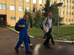 Canadian astronaut David Saint-Jacques heads back to his quarters at end of the day of training at the Gagarin Cosmonaut Training Center in Star City, Russia, on Thursday, Aug. 16, 2018.