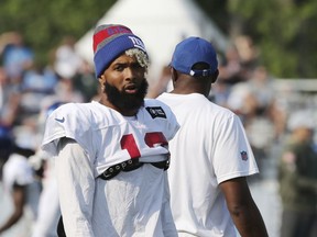 New York Giants receiver Odell Beckham Jr., walks on the field at the Detroit Lions football training facility, Tuesday, Aug. 14, 2018, in Allen Park, Mich.