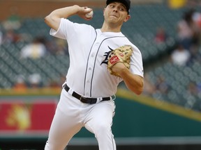 Detroit Tigers pitcher Artie Lewicki throws against the Chicago White Sox in the first inning of a baseball game in Detroit, Monday, Aug. 13, 2018.