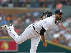 Detroit Tigers pitcher Mike Fiers throws against the Cincinnati Reds in the first inning of a baseball game in Detroit, Wednesday, Aug. 1, 2018.
