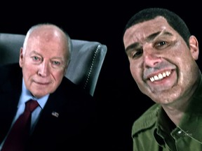 This image released by Showtime shows former Vice President Dick Cheney, left, and actor Sacha Baron Cohen, portraying retired Israeli Colonel Erran Morad in a still from "Who Is America?"