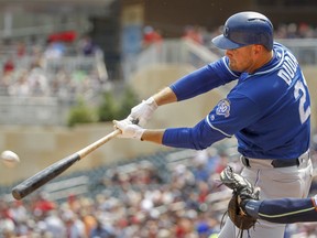 Kansas City Royals' Lucas Duda hits a two-run home run against the Minnesota Twins in the first inning of a baseball game Sunday, Aug. 5, 2018, in Minneapolis.