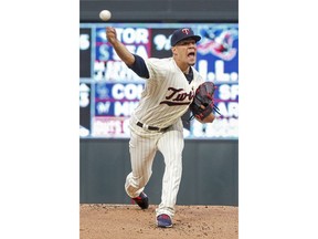 Minnesota Twins starting pitcher Jose Berrios throws to the Kansas City Royals in the first inning of a baseball game Saturday, Aug. 4, 2018, in Minneapolis.