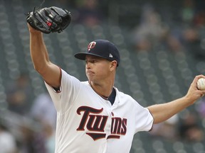 CORRECTS SPELLING TO WHITE SOX NOT WHILE SOX Minnesota Twins pitcher Stephen Gonsalves makes his major league debut as he throws against the Chicago White Sox in the first inning of a baseball game Monday, Aug. 20, 2018, in Minneapolis. It was a makeup game due to an April 15 weather postponed game.