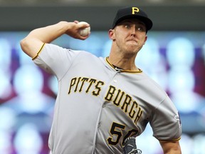 Pittsburgh Pirates pitcher Jameson Taillon throws against the Minnesota Twins in the first inning of a baseball game Tuesday, Aug. 14, 2018, in Minneapolis.