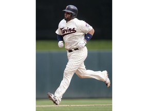 Minnesota Twins' Bobby Wilson rounds the bases on a solo home run off Pittsburgh Pirates' Keone Kela in the seventh inning of a baseball game Wednesday, Aug. 15, 2018, in Minneapolis. The Twins won 6-4.