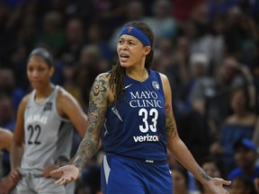FILE - In this July 13, 2018, file photo, Minnesota Lynx guard Seimone Augustus (33) argues with an official after being called for a technical foul during the second half of the team's WNBA basketball game against the Las Vegas Aces in Minneapolis. Technical fouls are up this year in the WNBA with more already called this season than last. There were 92 technical fouls given to players before the All-Star break. That's 11 more then all of last season. There were also 30 handed out to coaches already this season. There's still nearly 20 percent of the season left to play.