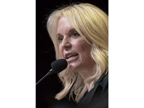 FILE - In this June 1, 2018, file photo, Republican state Sen. Karin Housley speaks at the Republican State Convention in Duluth, Minn. The sudden downfall of Sen. Al Franken amid the rise of the #MeToo movement could set up a two-woman race for his seat, part of an unusual primary featuring both of Minnesota's Senate seats on the same ballot. Franken's successor, Democrat Tina Smith, and the endorsed Republican candidate, state Sen. Karin Housley, were heavy favorites in their respective races.