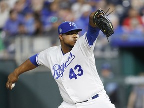 Kansas City Royals relief pitcher Wily Peralta throws to a Chicago Cubs batter during the ninth inning of a baseball game at Kauffman Stadium in Kansas City, Mo., Tuesday, Aug. 7, 2018.