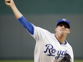 Kansas City Royals starting pitcher Heath Fillmyer throws during the first inning of a baseball game against the Toronto Blue Jays Tuesday, Aug. 14, 2018, in Kansas City, Mo.