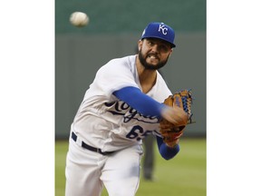 Kansas City Royals starting pitcher Jakob Junis throws during the first inning of a baseball game against the Detroit Tigers Tuesday, Aug. 28, 2018, in Kansas City, Mo.