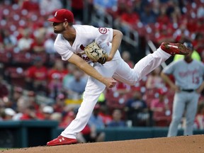 St. Louis Cardinals starting pitcher John Gant throws during the first inning of a baseball game against the Washington Nationals Tuesday, Aug. 14, 2018, in St. Louis.
