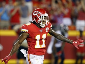 Kansas City Chiefs wide receiver Demarcus Robinson celebrates his touchdown during the first half of an NFL preseason football game against the Houston Texans in Kansas City, Mo., Thursday, Aug. 9, 2018.