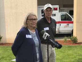 Linda and and Carney Matheny, parents of rescued hiker Matthew Matheney, speak of their son, Matthew B. Matheny, who was rescued after being missing for nearly a week, Wednesday, Aug. 15, 2018, in front of PeaceHealth Southwest Medical Center in Vancouver, Wash. His parents told reporters he was being treated for dehydration and would stay overnight, adding that he ate berries and killed bees that he also ate.