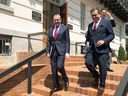 Mexican Foreign Minister Luis Videgaray, left, and Economy Minister Idelfonso Guajardo leave the Office of the United States Trade Representative Robert Lighthizer in Washington, Aug.10, 2018.