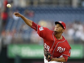 Washington Nationals starting pitcher Jefry Rodriguez delivers during the first inning of a baseball game against the Miami Marlins, Saturday, Aug. 18, 2018, in Washington.