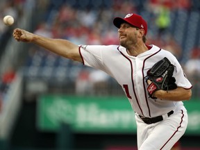 Washington Nationals starting pitcher Max Scherzer throws during the first inning of the team's baseball game against the Cincinnati Reds at Nationals Park, Thursday, Aug. 2, 2018, in Washington.