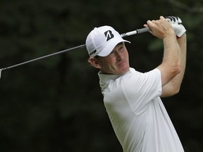 Brandt Snedeker watches his tee shot on the second hole during the third round of the Wyndham Championship golf tournament at Sedgefield Country Club in Greensboro, N.C., Saturday, Aug. 18, 2018.