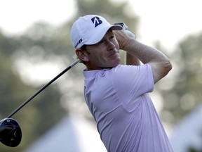 Brandt Snedeker watches his tee shot on the 11th hole during the first round of the Wyndham Championship golf tournament in Greensboro, N.C., Thursday, Aug. 16, 2018.