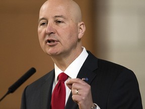 FILE - In this April 18, 2018, file photo, Nebraska Gov. Pete Ricketts speaks at the legislature, in Lincoln, Neb. Pope Francis' decree that the death penalty is "inadmissible" in all cases could pose a dilemma for Roman Catholic politicians and judges in the United States. Ricketts, a Republican and Catholic who worked to reinstate capital punishment in his state after lawmakers abolished it in 2015, said the pope's decree doesn't change his stance.