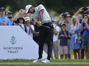 Tiger Woods hits a tee shot on the fifth hole during the third round of the Northern Trust golf tournament, Saturday, Aug. 25, 2018, in Paramus, N.J.