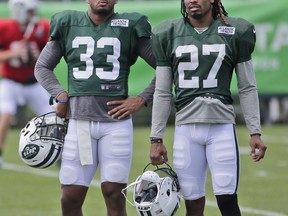New York Jets' Jamal Adams, left, and Darryl Roberts participate during practice at the NFL football team's training camp in Florham Park, N.J., Monday, Aug. 6, 2018.