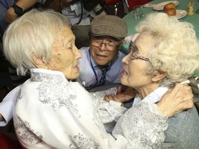 South Korean Cho Hye-do, 86, right, meets her North Korean sister Cho Sun Do, 89, left, during the Separated Family Reunion Meeting at the Diamond Mountain resort in North Korea, Monday, Aug. 20, 2018.