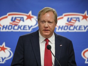 FILE - This Aug. 4, 2017 file photo shows Jim Johannson speaking during a news conference in Plymouth, Mich. Auston Matthews and Patrick Kane were among dozens of U.S.-born NHL hockey players who gathered for a charity game won by the Blue over the White 14-9. The event honored longtime USA Hockey executive Jim Johannson, who died at age 53 in January.