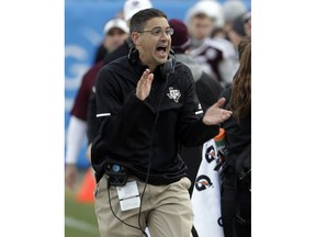 FILE - In this Dec. 29, 2017, file photo, then-Texas A&M interim head coach Jeff Banks encourages his team after a touchdown against Wake Forest during the second half of the Belk Bowl NCAA college football game, in Charlotte, N.C. Coach Nick Saban had to recruit six assistant coaches during the offseason while elevating two others to coordinator positions. He landed a group he's hoping will help the top-ranked Crimson Tide contend for not only more championships but more of the nation's top prospects. Banks is now the Alabama special teams coordinator/tight ends.