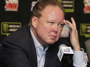 FILE - In this Nov. 19, 2017, file photo, Brian France, NASCAR Chairman, ponders a question during a news conference at Homestead-Miami Speedway in Homestead, Fla. NASCAR chairman Brian France has been arrested in New York's Hamptons for driving while intoxicated and criminal possession of oxycodone. France was arrested at 7:30 p.m. Sunday, Aug. 5, 2018, and held overnight. He was arraigned Monday at Sag Harbor Village Justice Court and released.