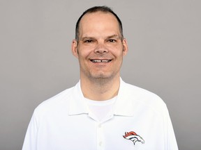 FILE - This is a 2016 file photo showing Tom Heckert of the Denver Broncos NFL football team. The Broncos say former personnel executive Tom Heckert died Sunday night, Aug. 5, 2018, following a long illness. Heckert, 51, stepped away from the Broncos after last season after being diagnosed in recent years with amyloidosis, a rare disease that causes a buildup of amyloid proteins in the heart, kidney, liver and other organs. (AP Photo/File)