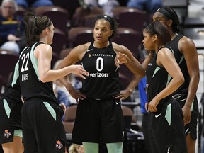 FILE - In this May 8, 2018, file photo, New York Liberty's Marissa Coleman, center huddles with teammates during a preseason WNBA basketball game against the Connecticut Sun in Uncasville, Conn. While most of the WNBA is vying for playoff positioning in one of the most competitive finishes to a WNBA regular season, New York, Indiana, Chicago and Las Vegas are jockeying for the draft lottery.