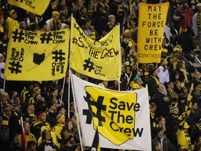 FILE - In this Oct. 31, 2017, file photo, Columbus Crew fans show their support for the team before the start of their MLS Eastern Conference semifinal soccer match against New York City FC in Columbus, Ohio. The owner of the Crew has been pushing for months to move his team to Austin. But picking up and relocating from Ohio hasn't been easy. It hasn't been a slam-dunk deal in Austin and the state of Ohio is suing to block the move. A Thursday, Aug. 9, 2018, vote on an Austin stadium plan could pave the way to Texas